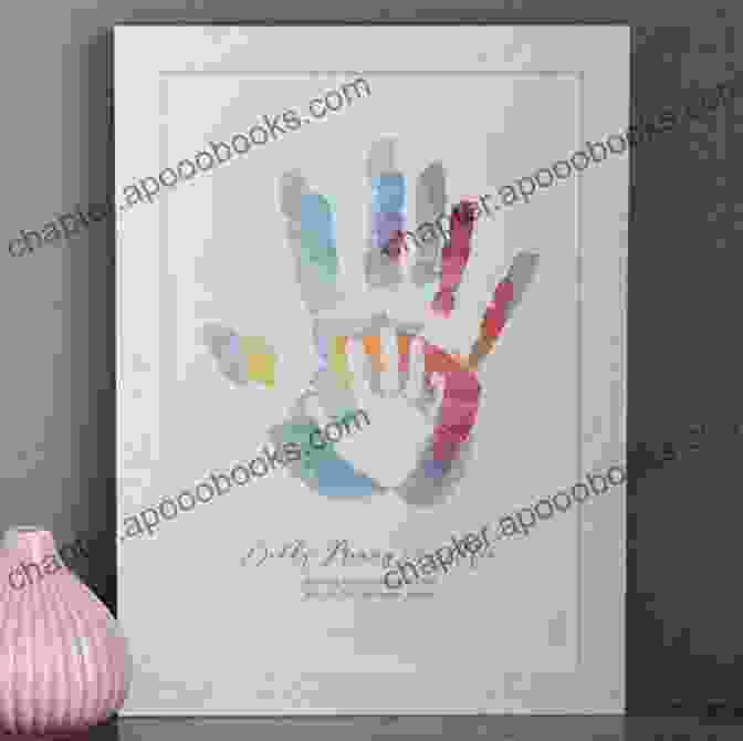 A Framed Piece Of Art With A Child's Handprint And Footprint Our Best Knit Baby Afghans: 33 Designs To Give Your Favorite Little One A Gift To Cherish For A Lifetime