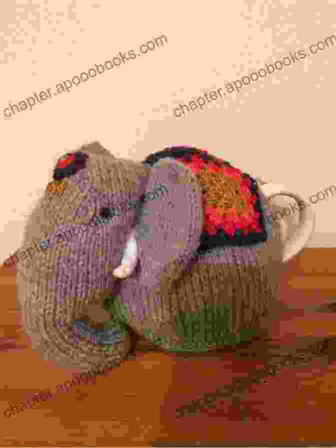 A Knitted Elephant Tea Cozy With Lifelike Eyes, Trunk, And Floppy Ears Really Wild Tea Cosies Loani Prior