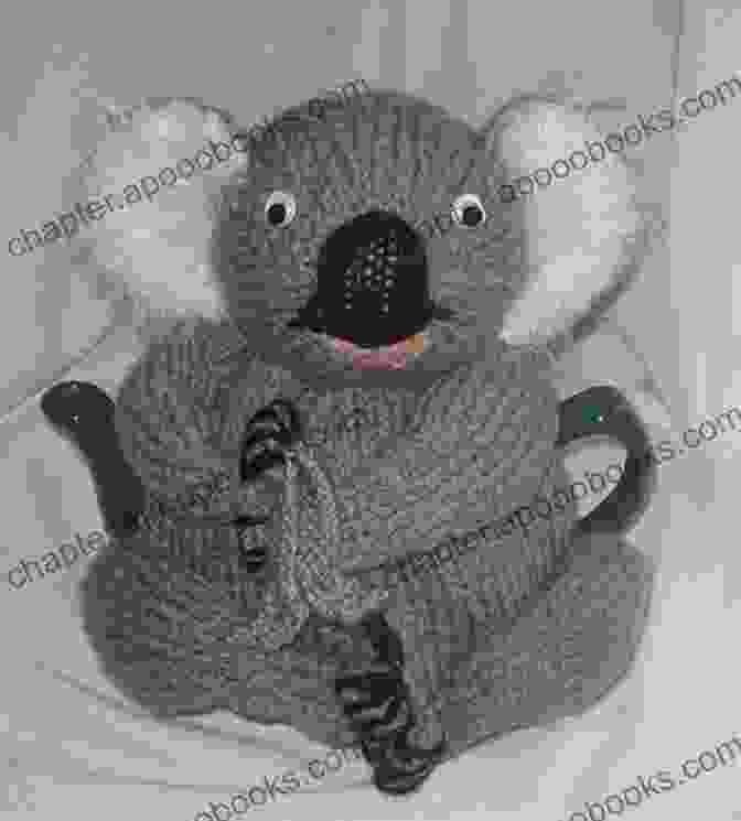 A Knitted Koala Tea Cozy With Soft Fur, Adorable Eyes, And A Eucalyptus Leaf Really Wild Tea Cosies Loani Prior