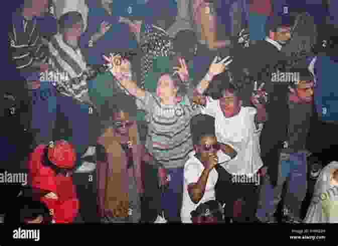 A Large Crowd At A Rave In The 1990s Energy Flash: A Journey Through Rave Music And Dance Culture