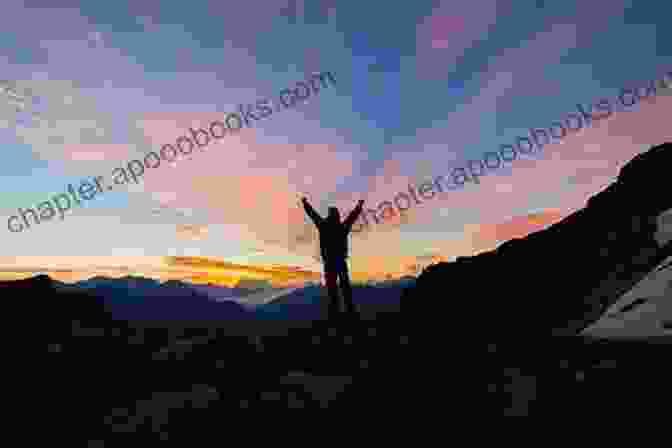 A Man Standing Atop A Mountain, Arms Outstretched, Looking Out Over A Vast Landscape. A Disrupted Life A Memoir