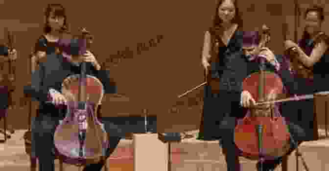 A Photograph Of Two Cellists Performing In A Concert Hall. Scottish Melodies For Two Cellos