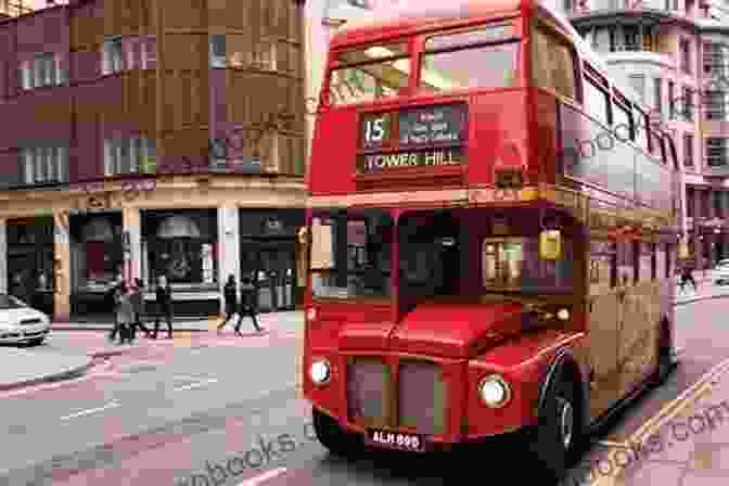 A Red New Routemaster Bus Driving Down A Street In London London S Buses: The Colourful Era 1985 2005