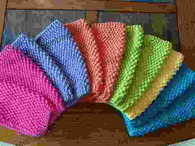 A Variety Of Colorful Knitted Dishcloths Laid Out On A Table Nifty Knit Dishcloths Leisure Arts