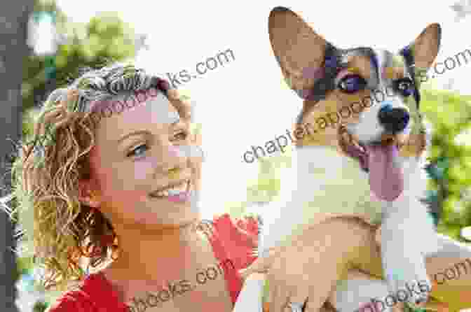 A Woman Bonding With Her Playful Dog In A Park. The Dog: Its Behavior Nutrition And Health