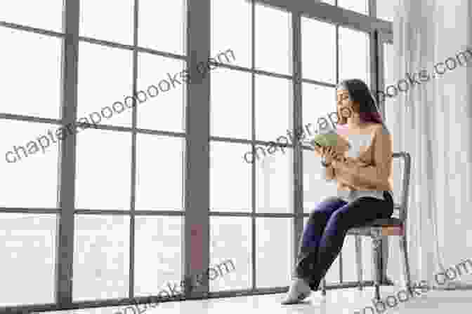 A Woman Sitting By A Bright Window, Reading A Book With A Serene Expression. A Disrupted Life A Memoir