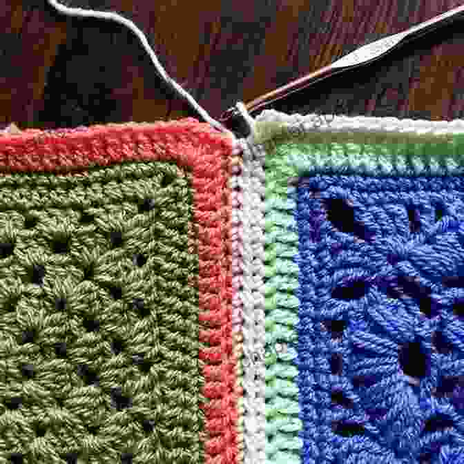 Close Up Of Granny Square With Intricate Stitching And Vibrant Colors Crochet Pattern Granny Square Coat PB093 R