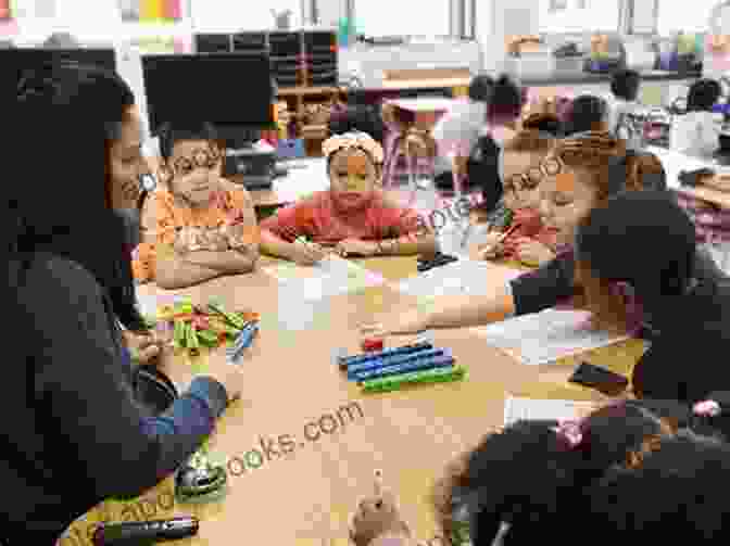 Image Of A Teacher Working With A Small Group Of Students At Different Ability Levels Basic Principles Of Curriculum And Instruction