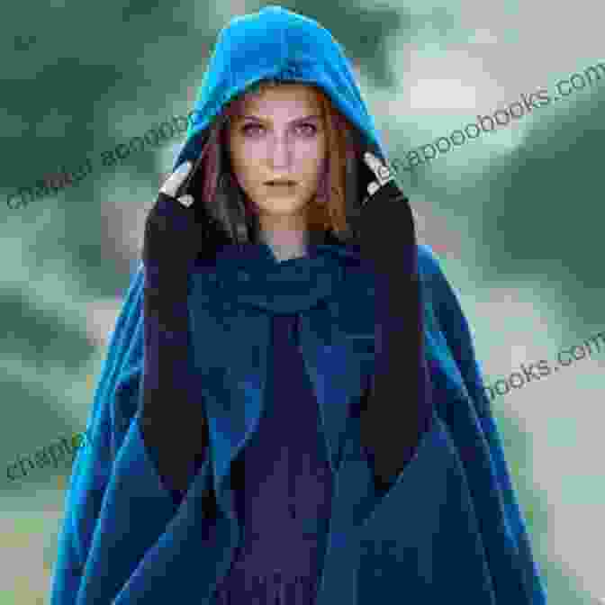 Woman Wearing The Snowflake Hooded Cape Styled With A Sweater Snowflake Hooded Cape Leisure Arts